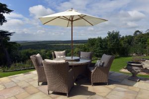 Outdoor dining areas of this countryside lodge